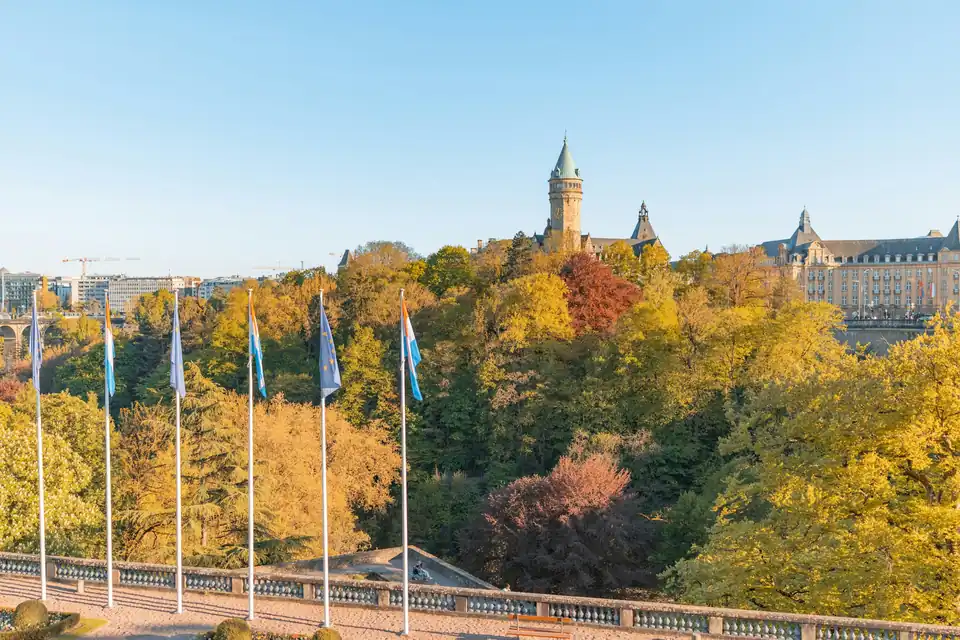 Autumn trees and the Spuerkeess tower above the Pétrusse valley