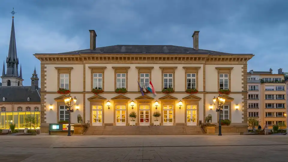 Luxembourg City hall lit at dusk on Place Guillaume II