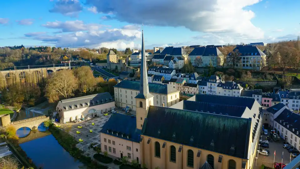 Neumünster Abbey and Saint John's church in the Grund