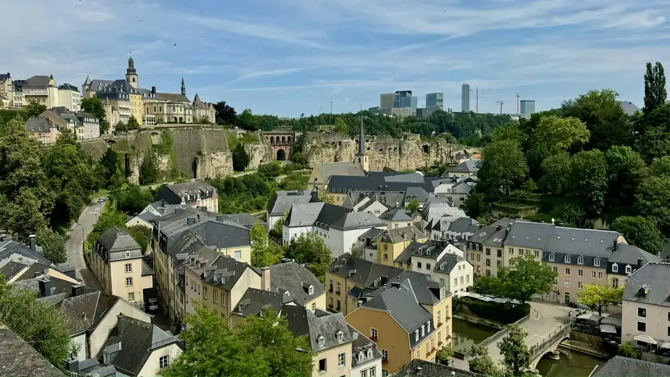 Lower town rooftops with the Kirchberg skyline in the distance