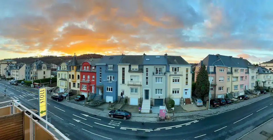 Colourful terraced houses along a residential road, Luxembourg City