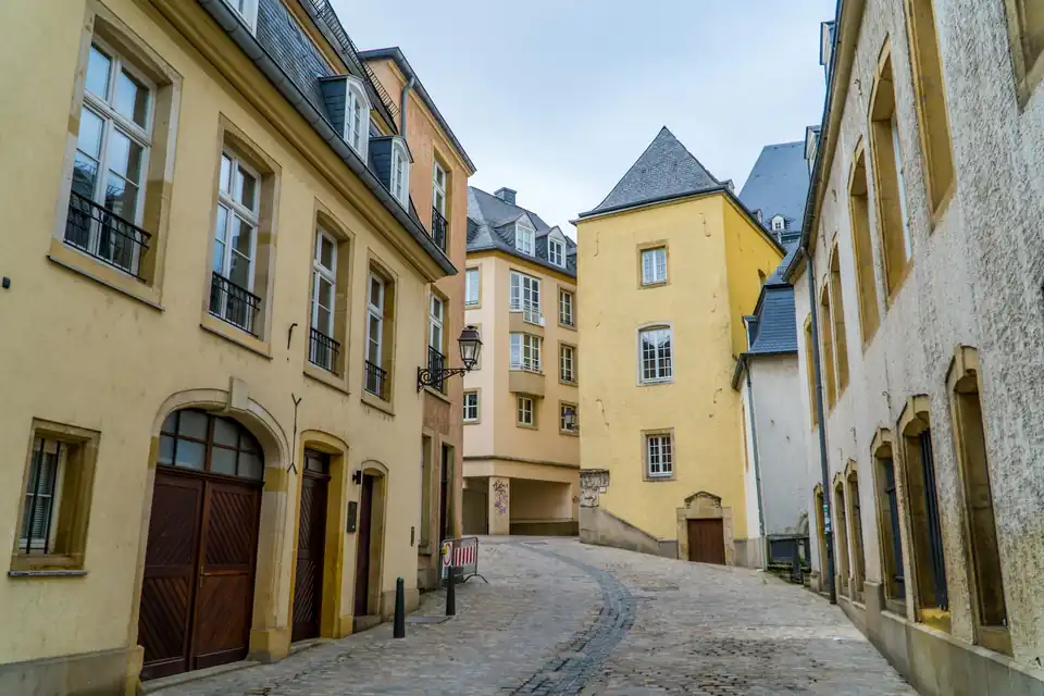 Cobbled street with yellow facades in the old town of Luxembourg City