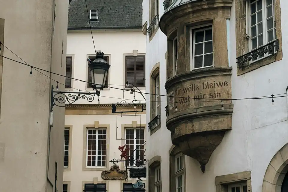 Historic facades with an oriel window in Ville Haute